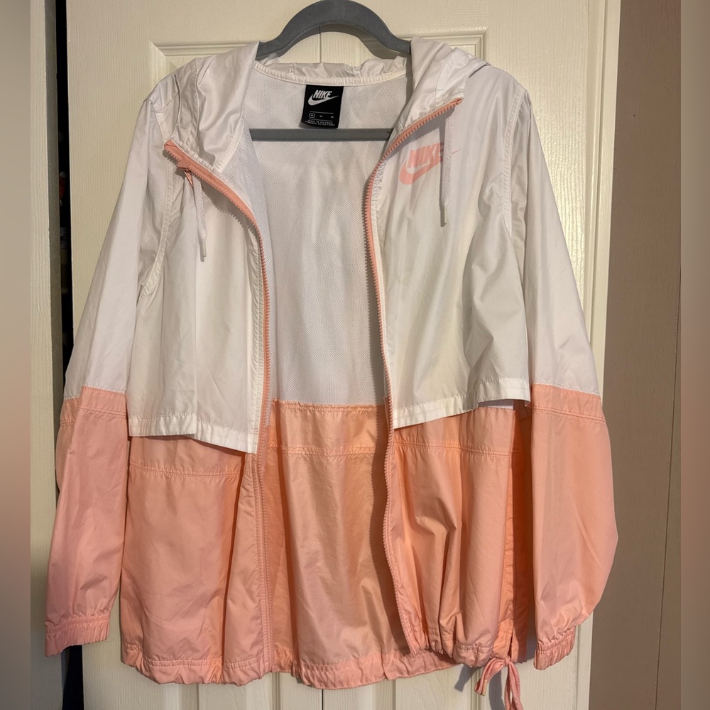 Nike Jacket. Thin, windbreaker material. Size M. Pink and White